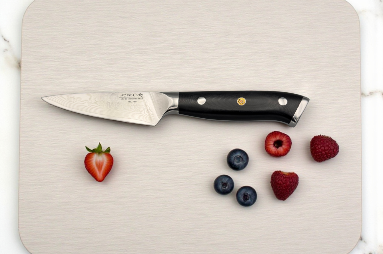 Image of Pro Chefly Damascus paring knife on cutting board with berries, highlighting sharp VG-10 blade and precise fruit prep.
