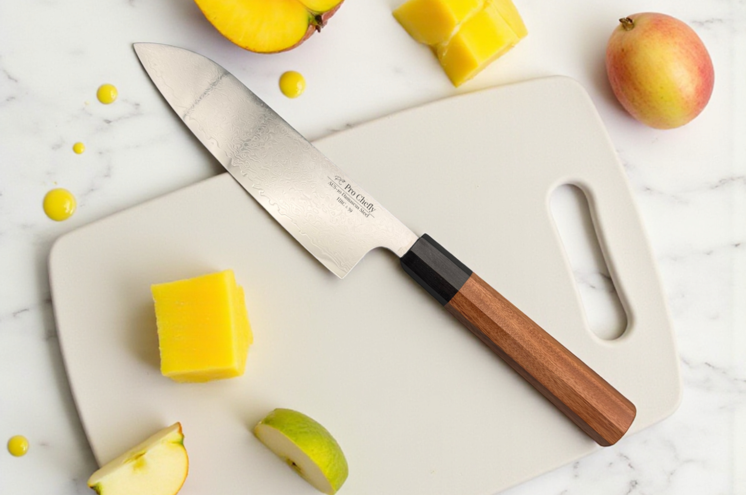 Image of Pro Chefly Japanese Damascus santoku knife resting on a white cutting board with fresh mango and apple slices on a marble surface.