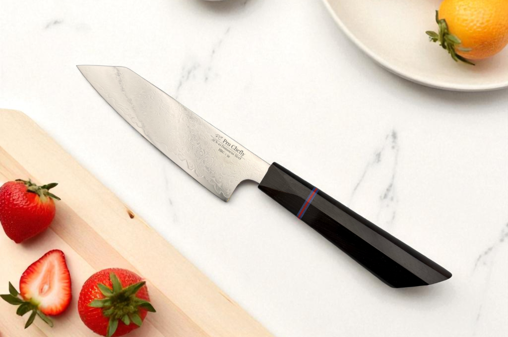 Image of Pro Chefly Damascus Japanese chef knife on a marble surface with strawberries, highlighting blade pattern and balanced design.