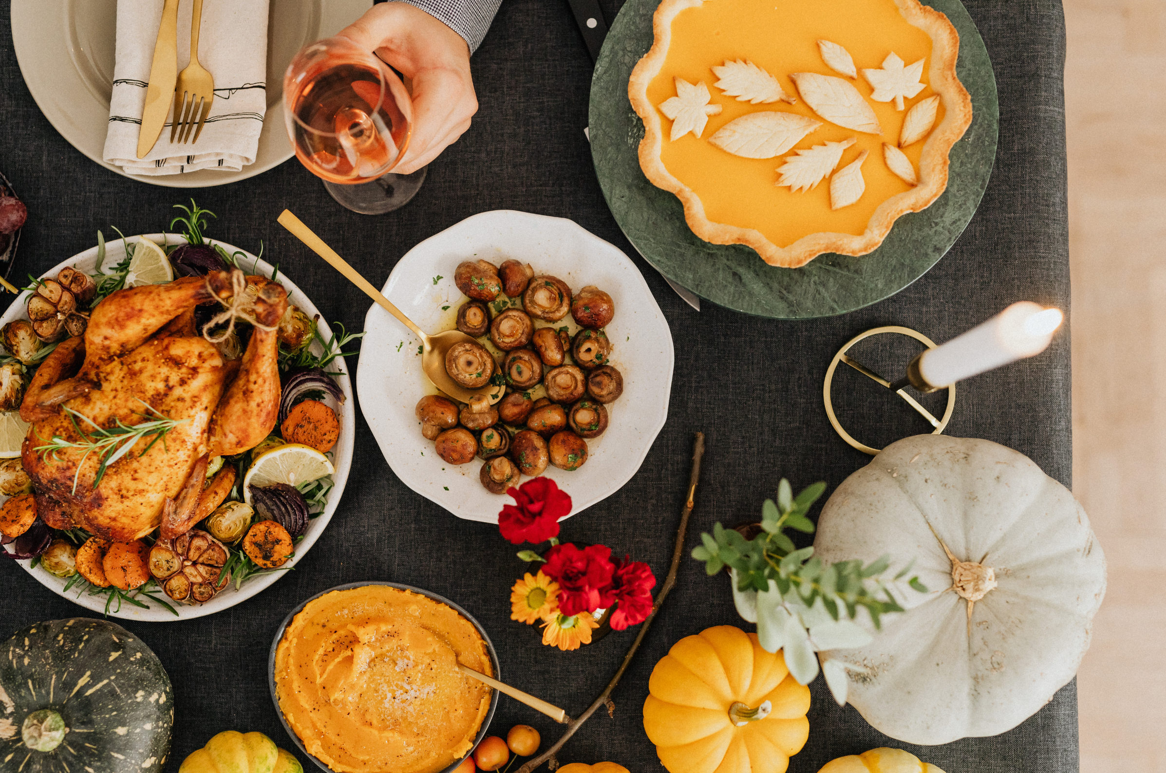 Image of Fall dinner table with roasted chicken, pumpkin pie, and seasonal sides, styled in warm light to reflect the Pro Chefly culinary lifestyle and handcrafted cooking excellence.