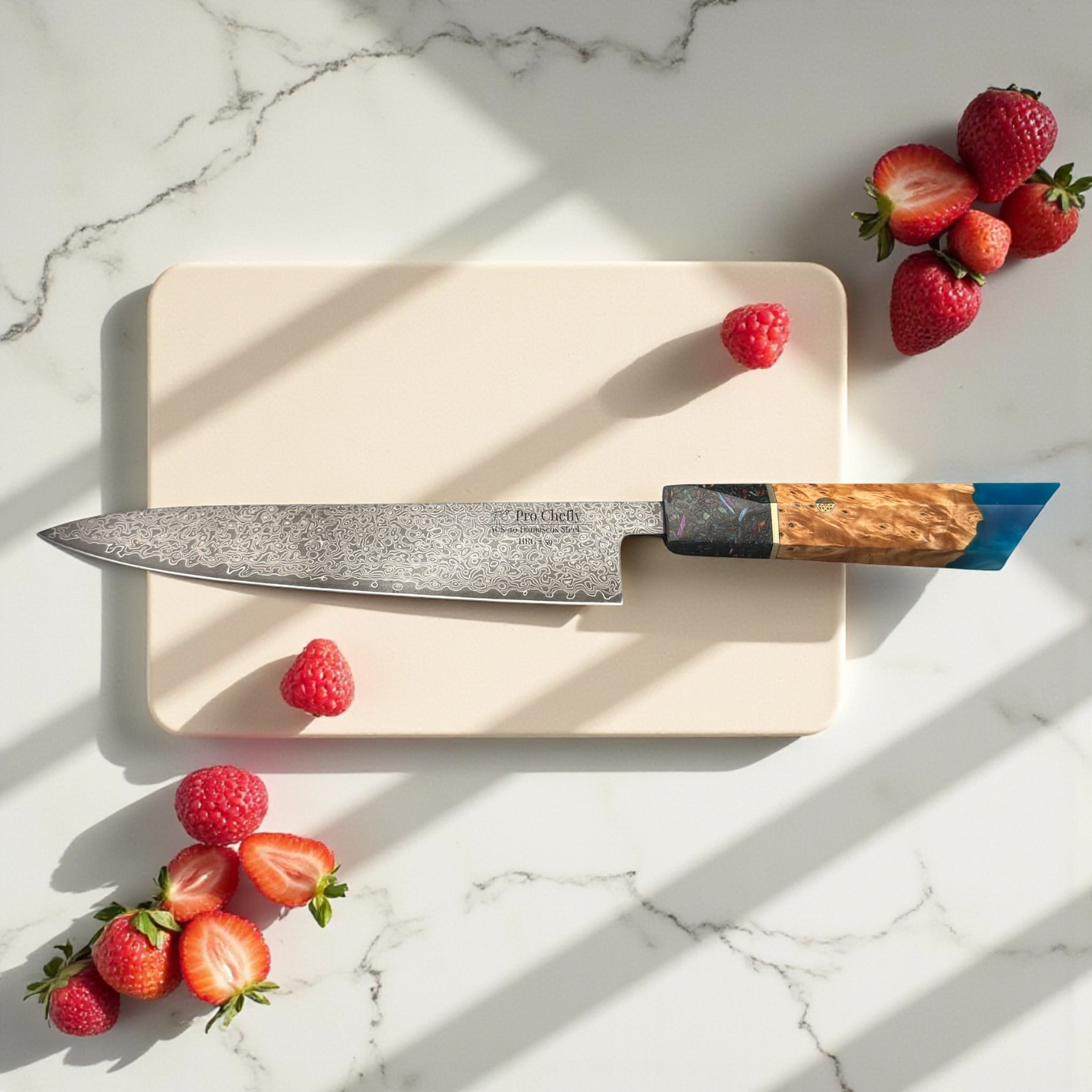 Image of Pro Chefly AUS-10 Damascus steel Japanese gyuto knife with resin and wood handle on plate with strawberries and raspberries.