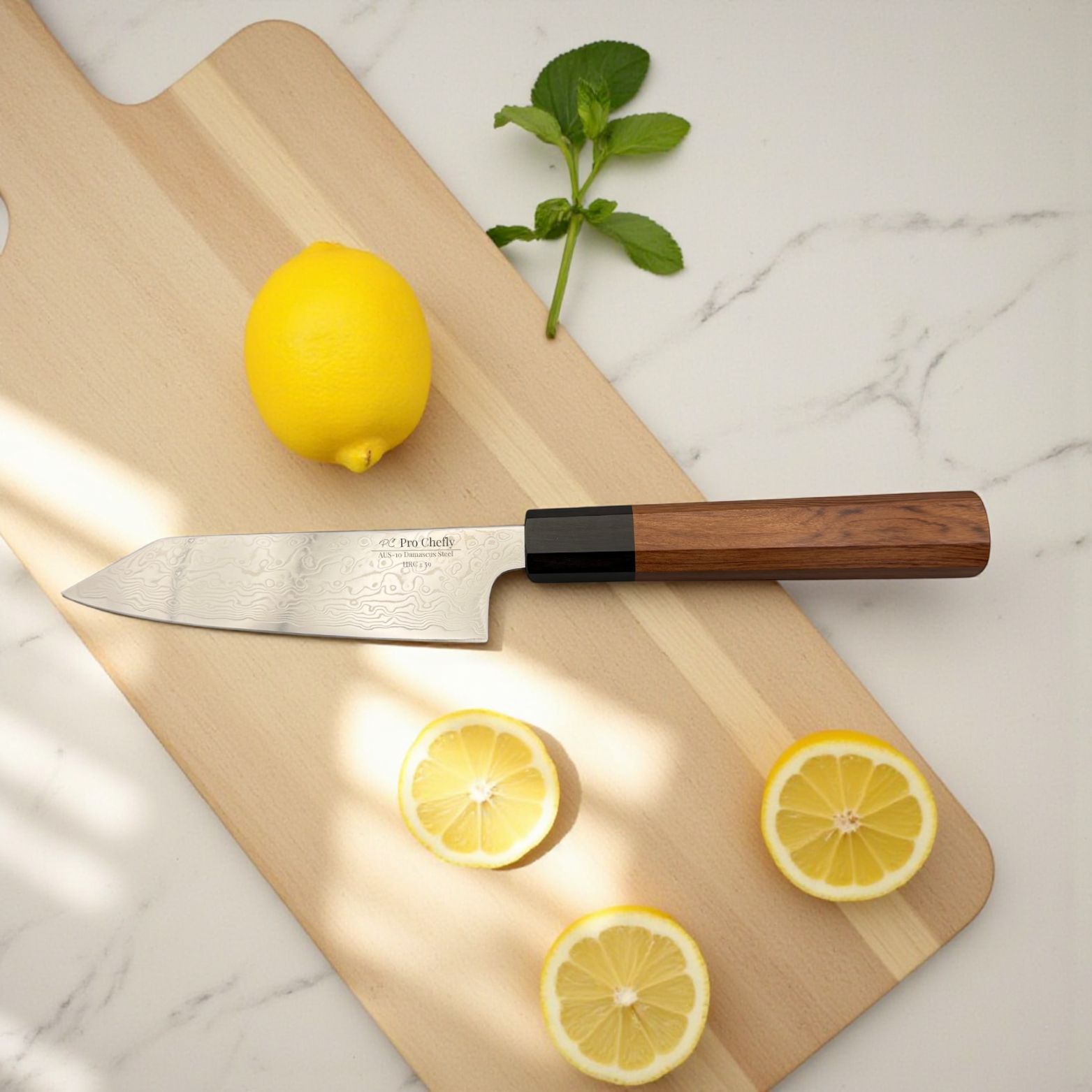 Image of Pro Chefly AUS-10 Damascus steel Japanese mini bunka knife with rosewood octagon handle slicing lemon on marble surface.