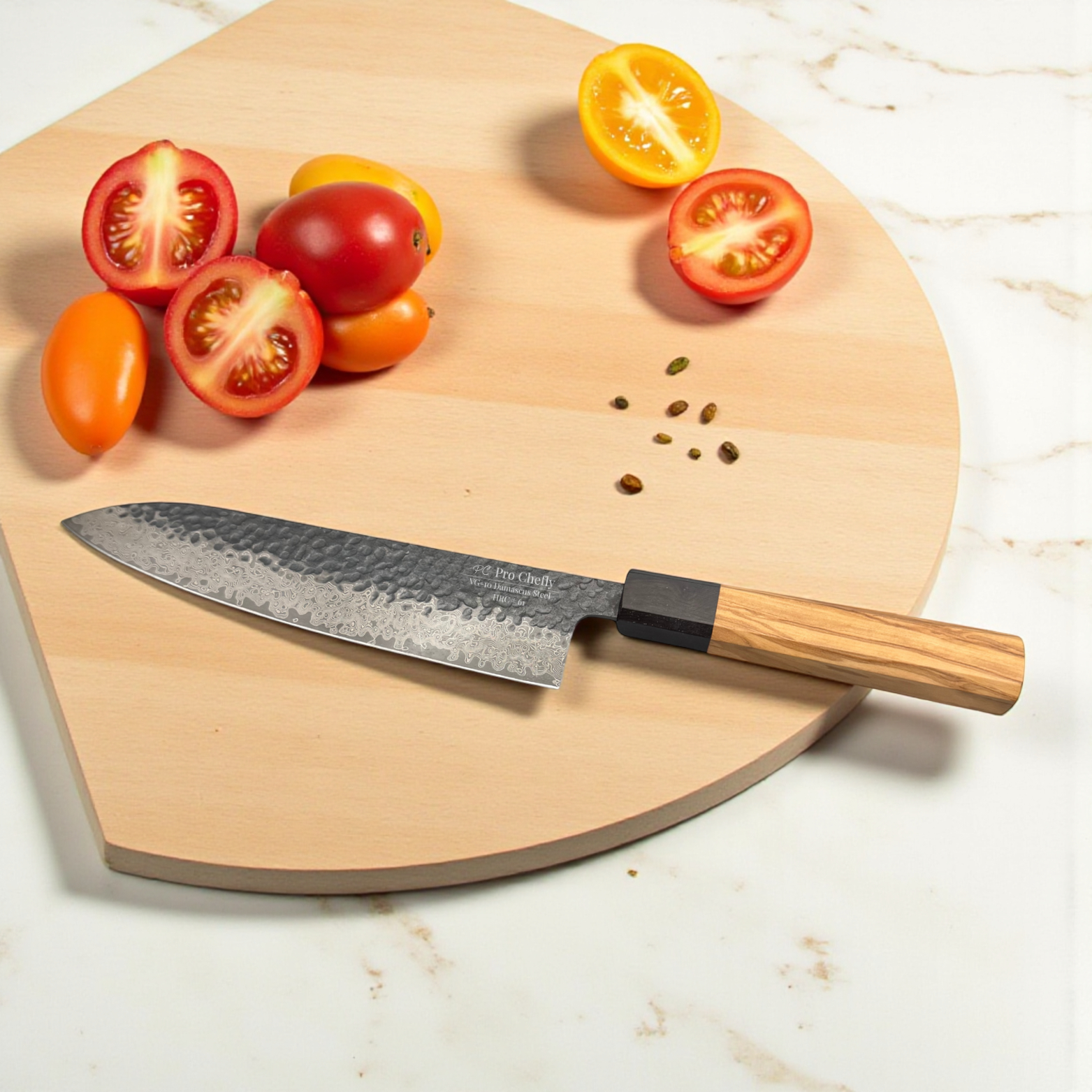 Image of Pro Chefly VG-10 Damascus steel Japanese chef knife with olivewood handle beside sliced tomatoes on a round cutting board.