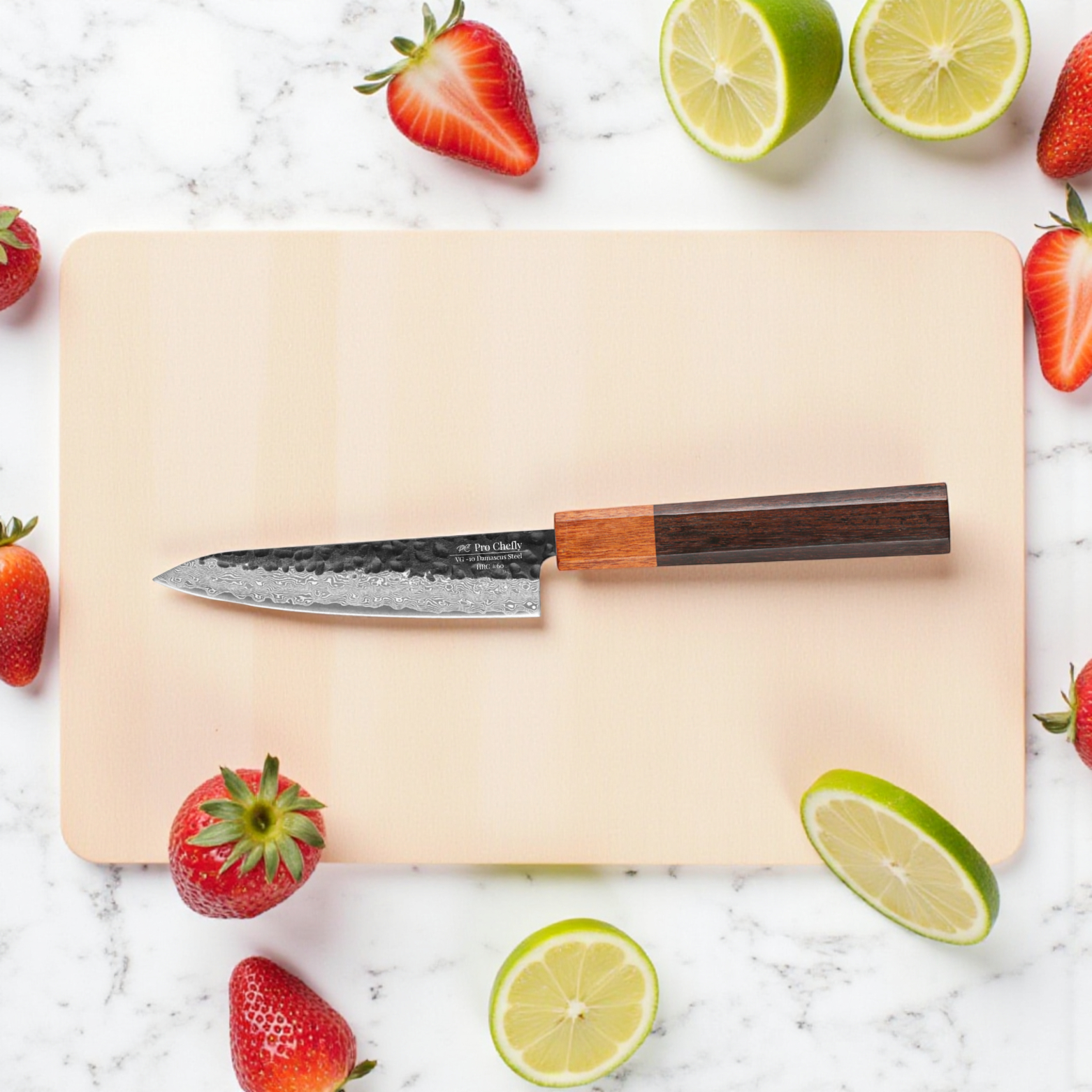 Image of Pro Chefly VG-10 Damascus steel Japanese petty knife with rosewood handle on cutting board with whole strawberries and limes.