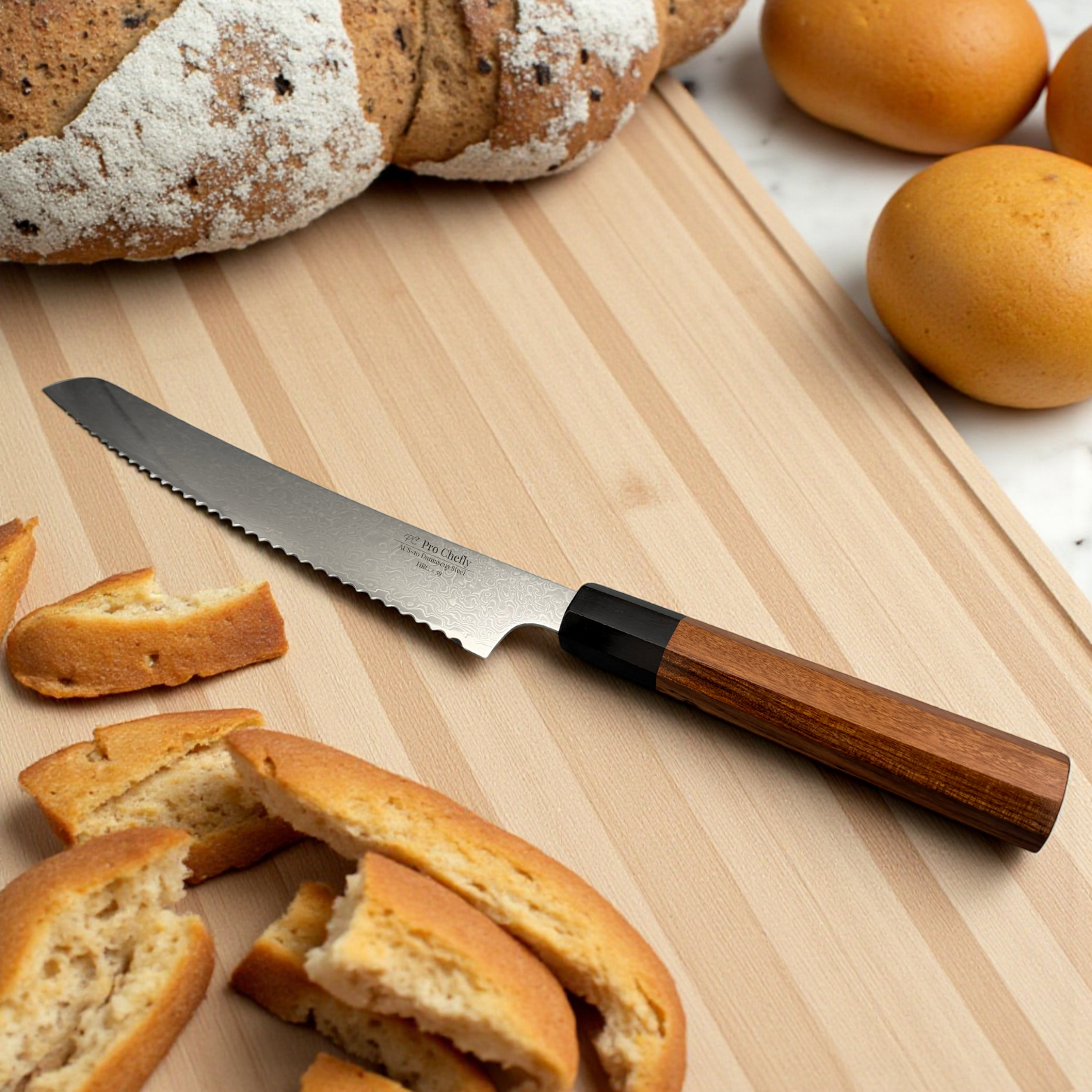 Image of Pro Chefly VG-10 Damascus serrated bread knife with rosewood octagon handle slicing baguette on marble board.