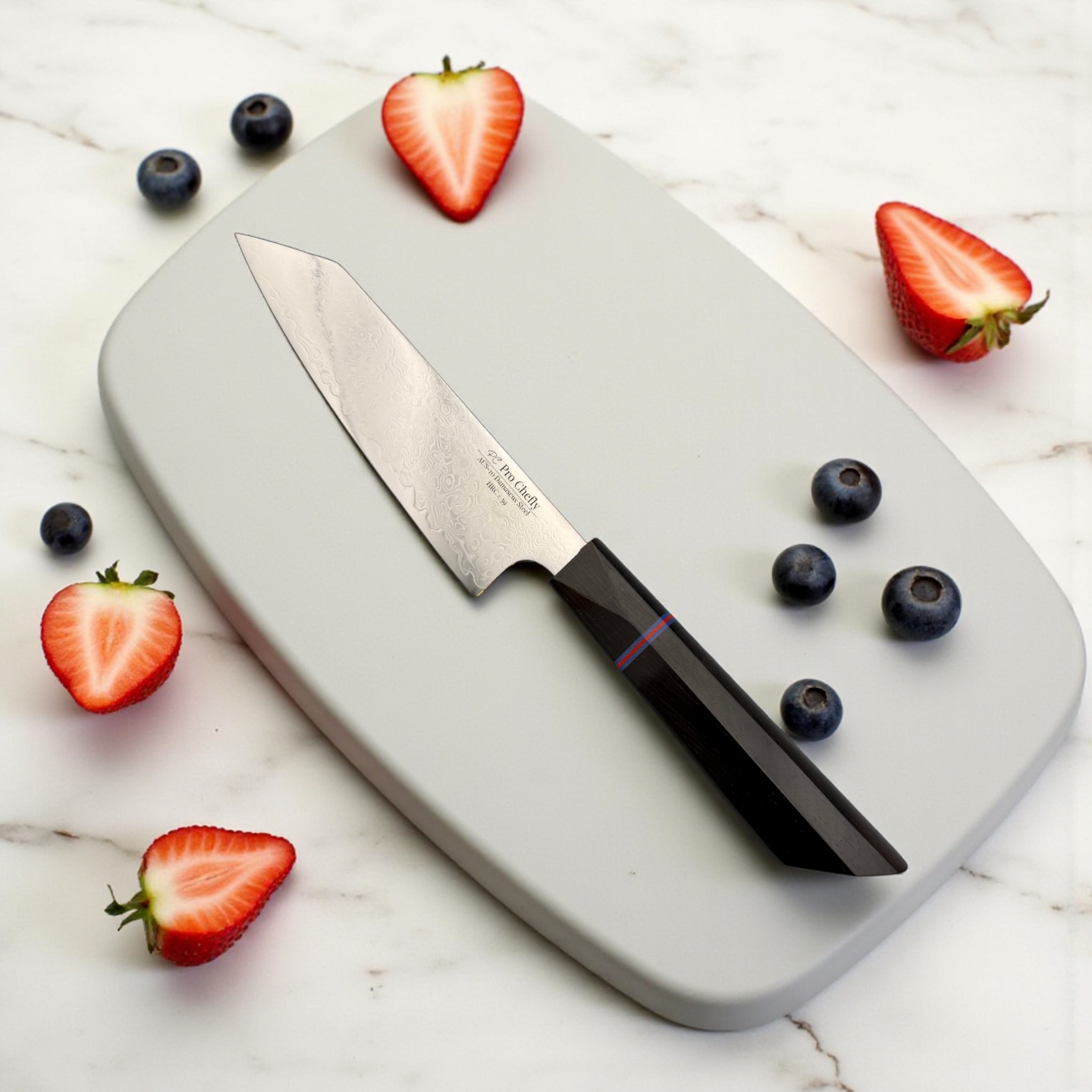 Image of Pro Chefly AUS-10 Damascus steel Japanese petty knife slicing strawberries and blueberries on a grey cutting board.