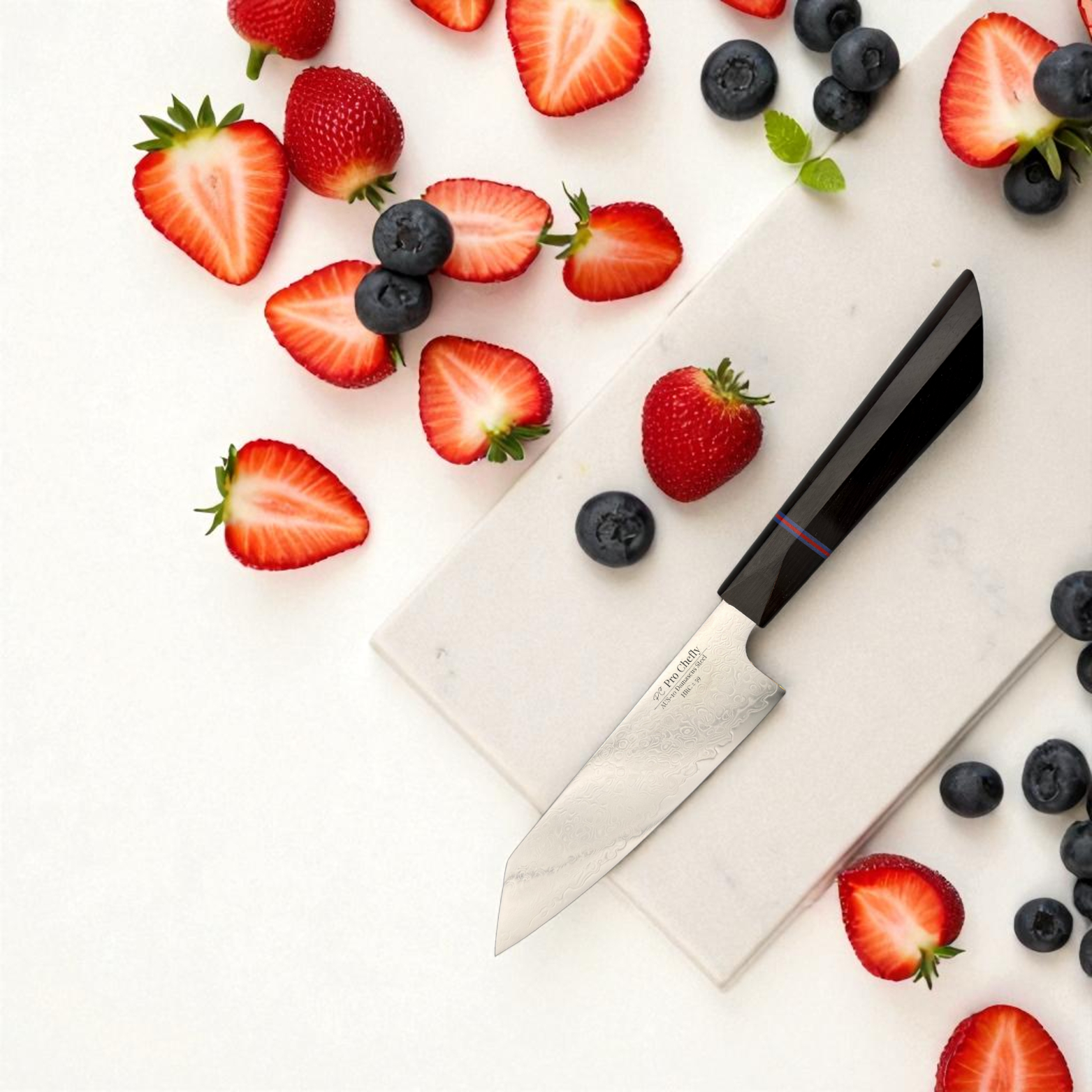 Image of Pro Chefly AUS-10 Damascus steel Japanese petty knife surrounded by sliced strawberries on marble surface.