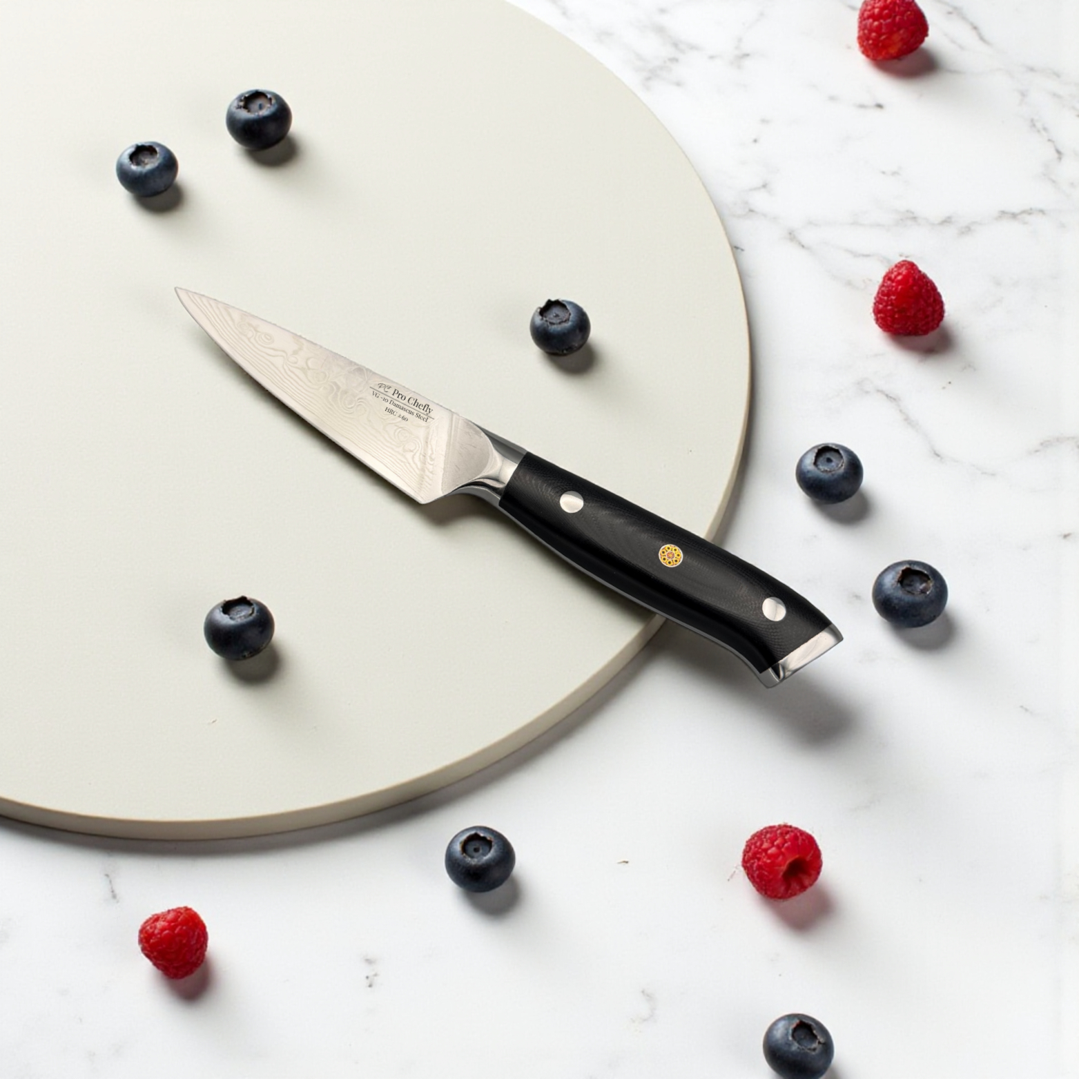 Image of Pro Chefly VG-10 Damascus steel Japanese paring knife with G10 fiberglass handle beside berries on plate.